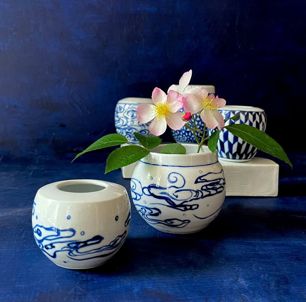 Two tiny wave vases