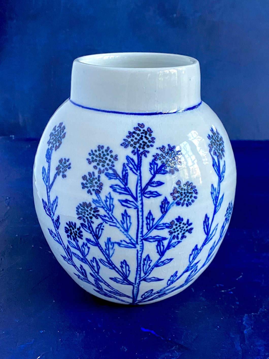 English porcelain scabiosa vase