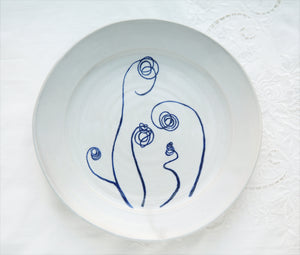 Zucchini shoot small round platter
