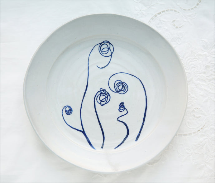 Zucchini shoot small round platter