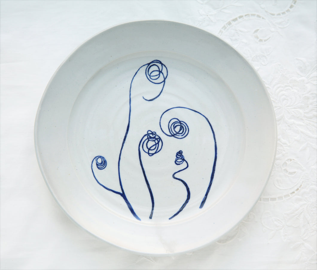 Zucchini shoot small round platter